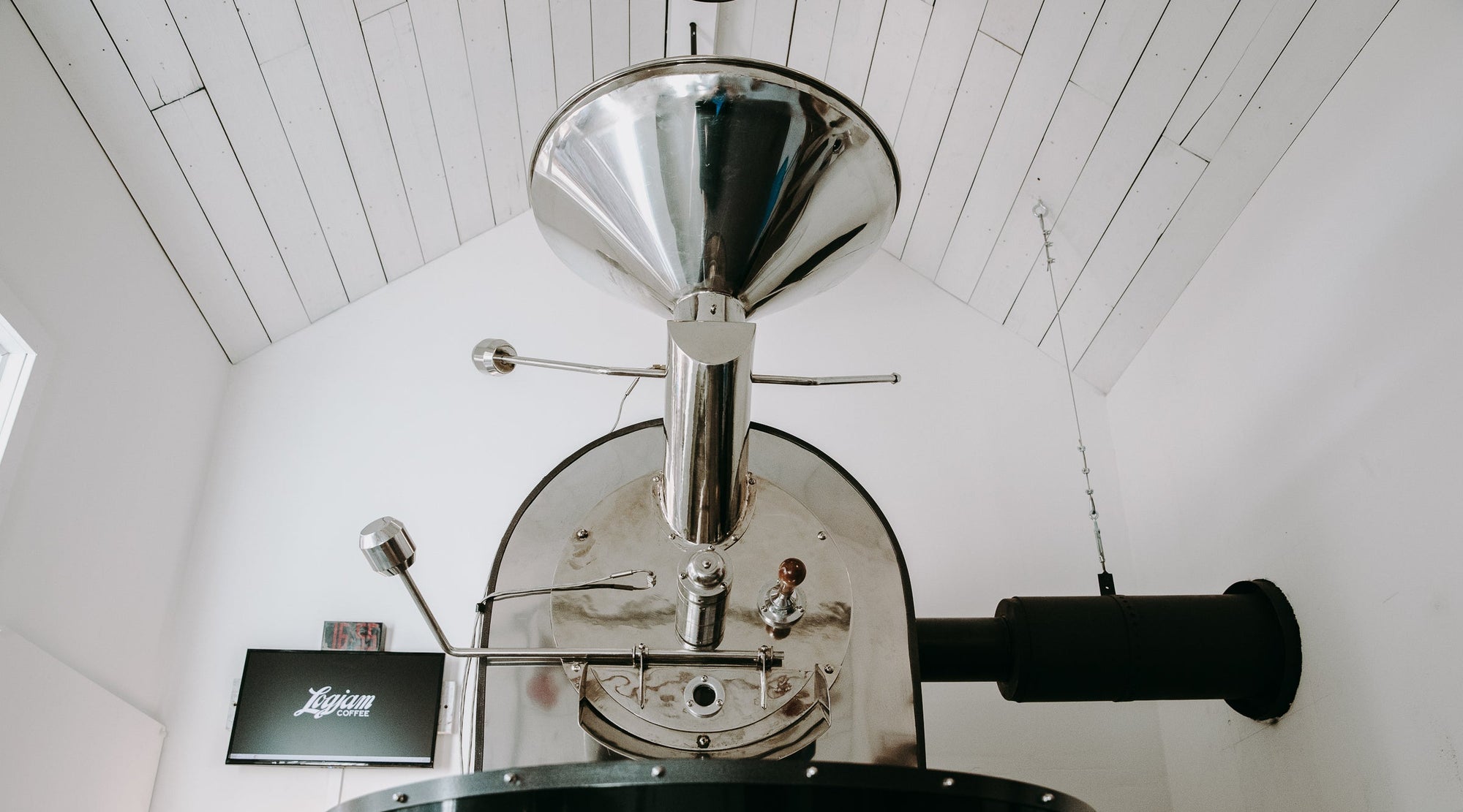 Coffee roaster machine on a white background