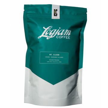 Teal and white coffee bag with 'Logjam Coffee' branding on a white background